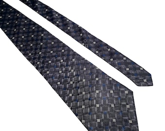 May include: A dark gray patterned tie with a geometric design featuring small white and blue squares.