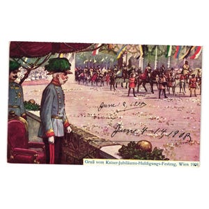 May include: Vintage postcard depicting a historical parade in Vienna, Austria. The image shows a man in uniform, a crowd, and horse-drawn carriages. The text on the postcard reads "June 2, 1908" and "June 4-14 1908".