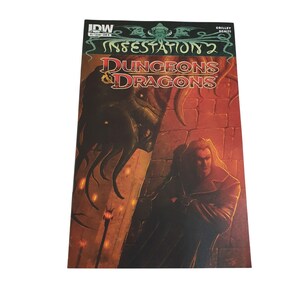 May include: A comic book cover for "Infestation 2: Dungeons & Dragons" features a dark, ominous illustration. A figure with long hair stands in a doorway, with a monstrous creature looming behind. The cover is predominantly red and black.