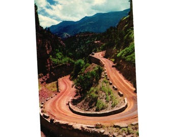 Vintage ansichtkaart Temple Drive Colorado Springs Scenic Road Cave Winds Colorado