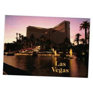 Statue fontaine Mirage dauphin carte postale vintage lumières du soir 2US NV 400 Vegas