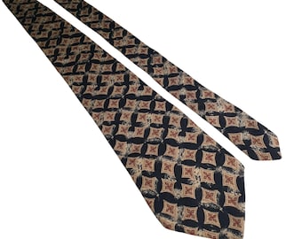 May include: A patterned necktie featuring a repeating geometric design in black, tan, and burgundy. The tie is angled, showcasing its length and the intricate pattern. The tie is a classic accessory.