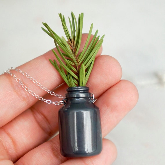 Items similar to Bottle shaped flower vase necklace in oxidized