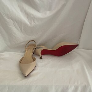 designer red sole shoes