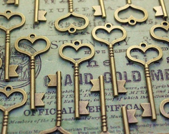 CLEARANCE 150 pcs Brass Heart skeleton Key Charm Double Sized Steampunk Supplies Wedding Key