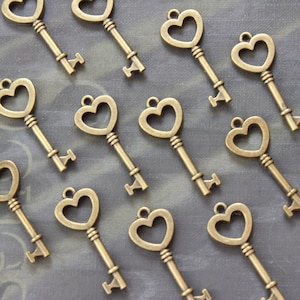 50 pcs Small Antique Brass Double sided skeleton Key Charm Steampunk Supplies Wedding Keys Heart Keys