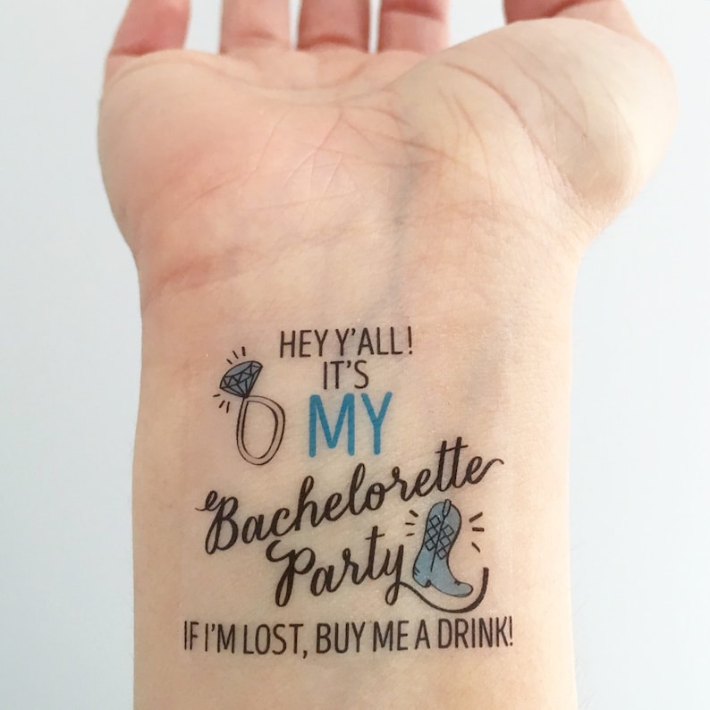 May include: A temporary tattoo with the text "HEY Y'ALL! IT'S MY BACHELORETTE PARTY IF I'M LOST, BUY ME A DRINK!"  The tattoo features a blue diamond ring and a blue cowboy boot.