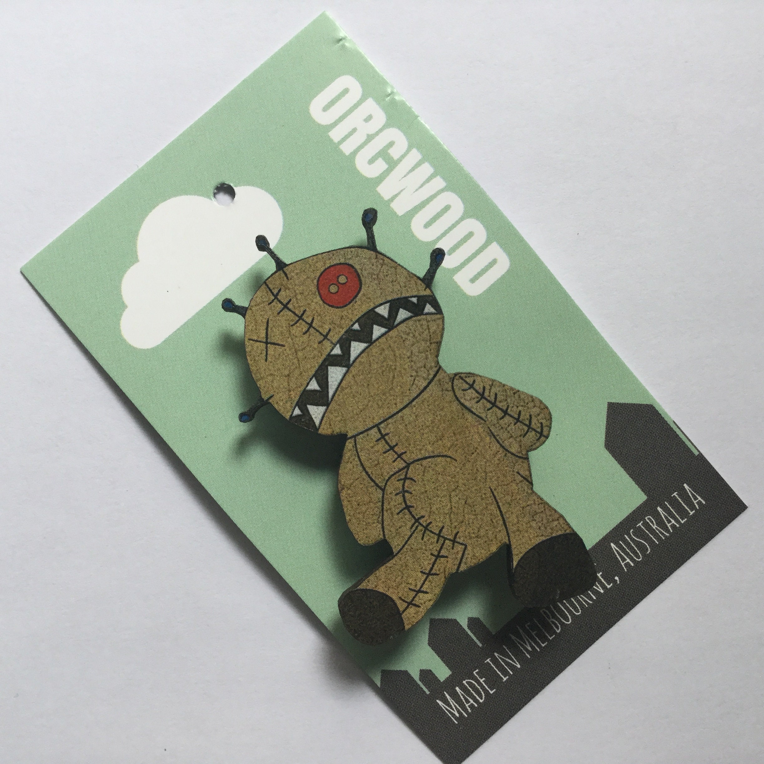 wooden voodoo doll