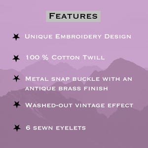 May include: Image features the word "FEATURES" in a light gray box. Below are bullet points describing the product: unique embroidery design, 100% cotton twill, metal snap buckle with antique brass finish, washed-out vintage effect, and 6 sewn eyelets.