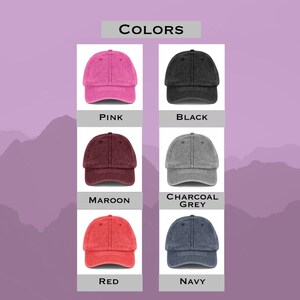 May include: A display of six baseball caps in various colors: pink, black, maroon, charcoal grey, red, and navy. The word "COLORS" is at the top. Each cap is shown against a white background with the color name below.