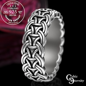 May include: A sterling silver ring with a Celtic knot design. The ring is nickel-free and made in the USA. The ring has a detailed, interwoven pattern and a polished finish. The ring is a band style and is suitable for everyday wear.