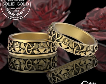 May include: Gold-colored rings with Celtic knot and Claddagh designs. The rings are displayed on a reflective surface, with the text "GENUINE 10K 14K 18K SOLID GOLD" and "MADE IN THE USA" visible. The rings are from "Celtic Eternity".