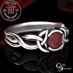 Anillo de compromiso con rubí celta y diseño de nudo de la trinidad en plata de ley 405