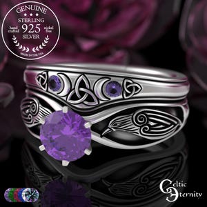 May include: A sterling silver ring set with Celtic knot and bird designs. The rings feature purple gemstones and are marked "925 SILVER" and "MADE IN THE USA". The set is from "Celtic Eternity".