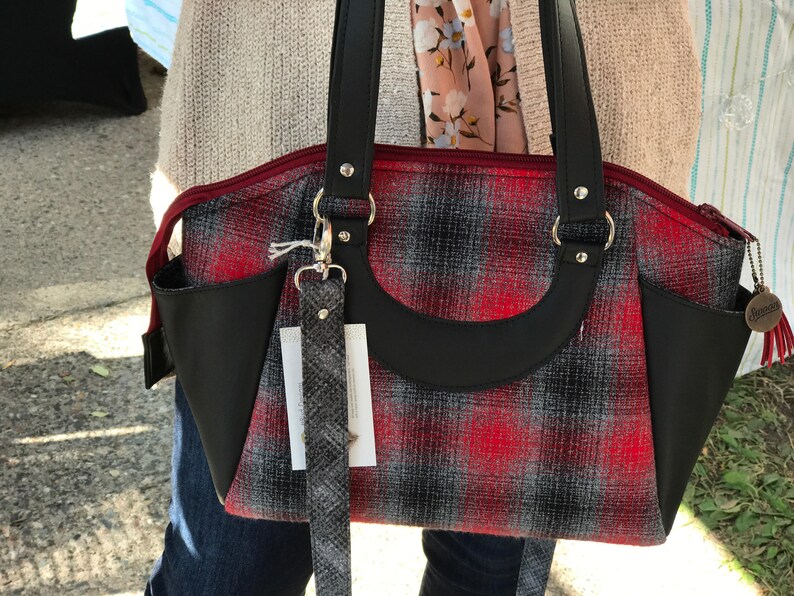 red and black plaid purse