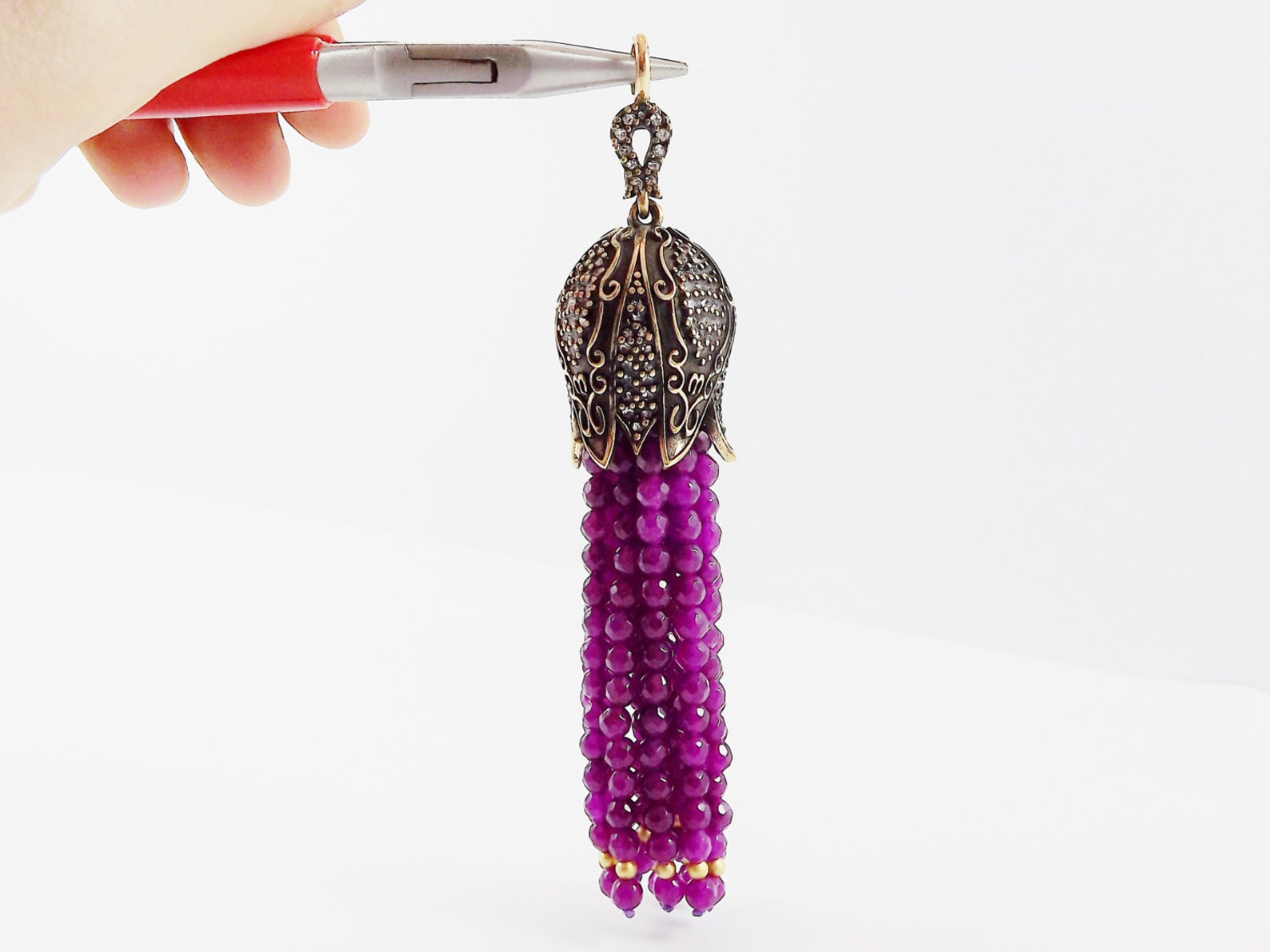 Tassel and Pendant Chain Motif on Mint Green Grid with Indigo and Maroon Highlights and Dotted Arcs main image 0