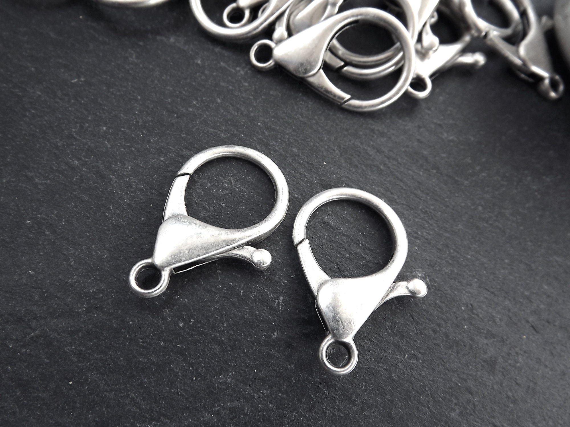 thumbnail image 2 of Bulk 100 Pack - Premium Metal Lobster Claw Clasp Hook Craft Findings - 1.5 Inch Clip With Trigger Snap And Round Eye Swivel D Ring By Specialist ID (Silver 2 of 12