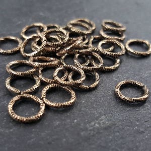8mm Twisted Etched Jump Rings Antique Bronze Plated - 30pcs