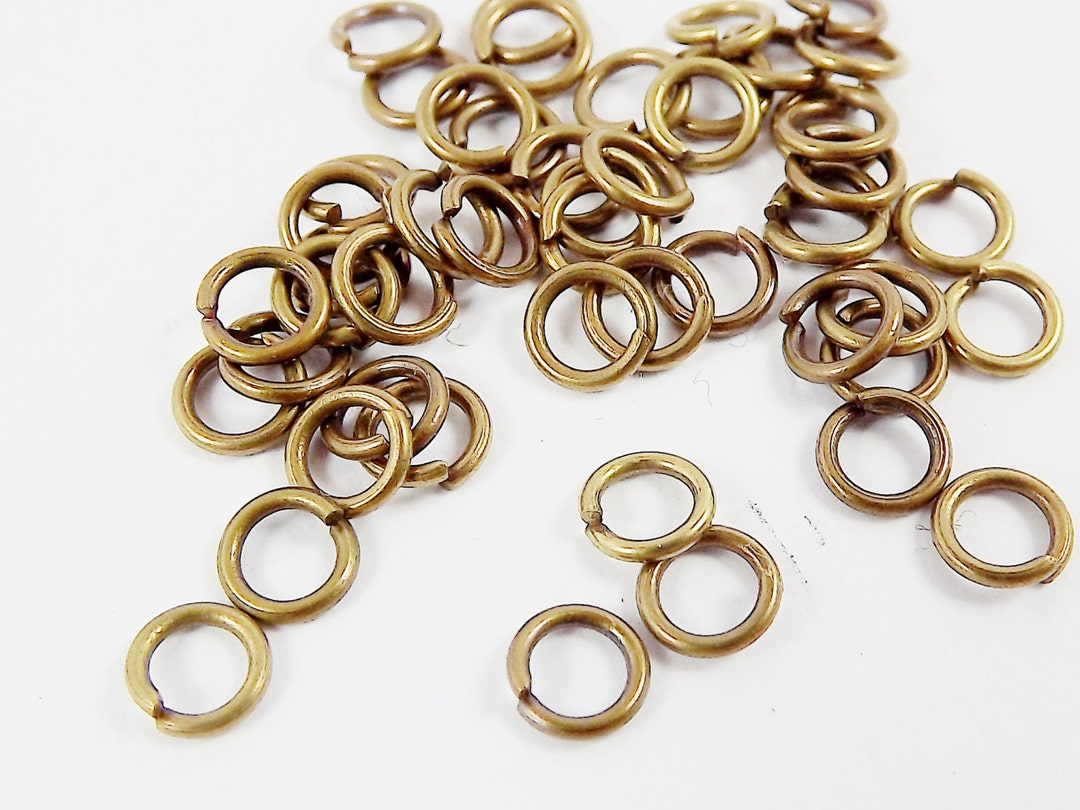 Acquista Ciondoli per connettori fiore color bronzo antico 40x28mm Acquista Ciondoli per connettori fiore color bronzo antico 40x28mm