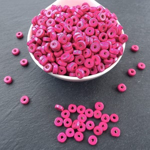 10109221 - Six Pink Hard Candy Rondelle Beads