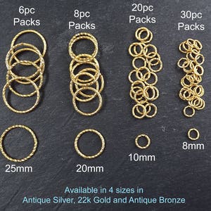 May include: Gold jump rings in four sizes: 8mm, 10mm, 20mm, and 25mm.  The rings are available in packs of 6, 8, 20, and 30.  The text "Available in 4 sizes in Antique Silver, 22k Gold and Antique Bronze" is at the bottom of the image.