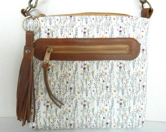 Spring flowered leather crossbody bag.  Floral leather crossbody or shoulder bag. Vine and Branch Studio.