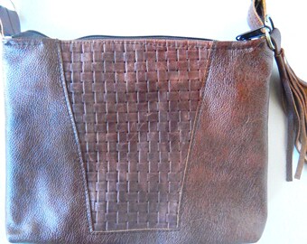 Soft brown leather crossbody or shoulder bag with woven leather trim.  Vine and Branch Studio.