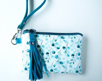 Leather wristlet or wallet with leafy print.  Vine and Branch Studio.