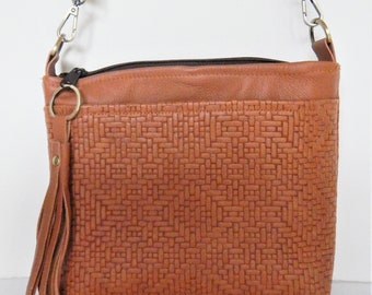 Tan, woven look leather, crossbody bag or shoulder bag.   Vine and Branch Studio.