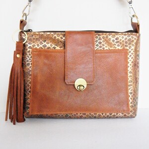 Leather crossbody or shoulder bag in  snakeskin print with metallic highlights.   Vine and Branch  Studio.