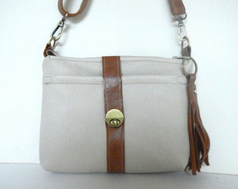 Ivory pebbled leather crossbody or shoulder bag with pockets.  Vine and Branch Studio.