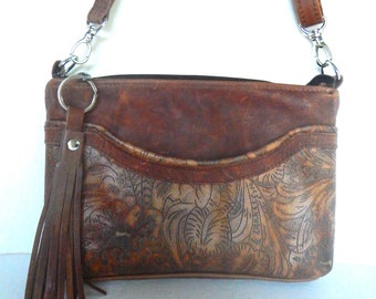 Western leather crossbody bag.  Shoulder or crossbody bag in western style embossed leather with vintage look leather trim. Vine and Branch.