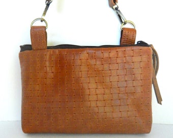 Brown embossed leather crossbody bag, with two separate zipper compartments and RFID protection. Vine and Branch Studio.