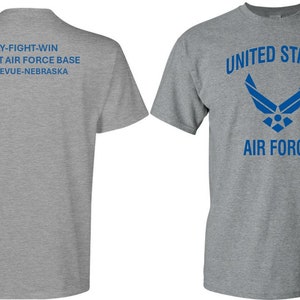 May include: Gray t-shirt with a blue United States Air Force logo on the front and the text "FLY-FIGHT-WIN OFFUTT AIR FORCE BASE BELLEVUE-NEBRASKA" on the back.