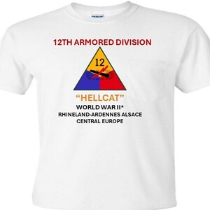 May include: White t-shirt with a pocket featuring a yellow triangle with the number 12 inside, a red and blue triangle with a tank and cannon graphic, and the text "12th Armored Division", "Hellcat", "World War II", "Rhineland-Ardennes Alsace", and "Central Europe".
