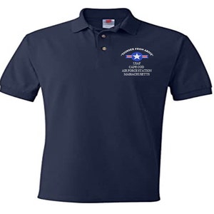 May include: A navy blue polo shirt with an embroidered patch that reads "Thunder From Above" and "USAF Cape Cod Air Force Station Massachusetts".