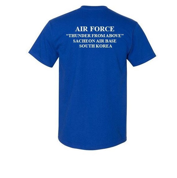 SACHEON Air Base * South Korea*  2-Sided Blue Shirt. USAF logo on front-Vinyl print on back. (Officially Licensed)