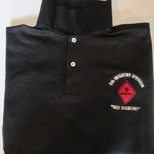 May include: Black polo shirt with a white embroidered patch that says "5th Infantry Division" and "Red Diamond".