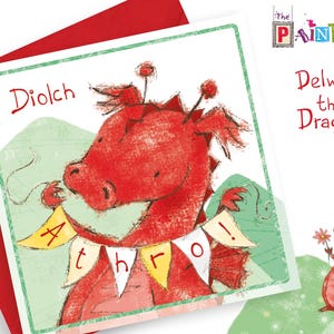 May include: A red dragon with a green background and a banner that says "Athro". The dragon is holding the banner in its mouth. The text "Diolch" is in the top left corner of the card. The text "Delwyn the Dragon" is in the top right corner of the card.