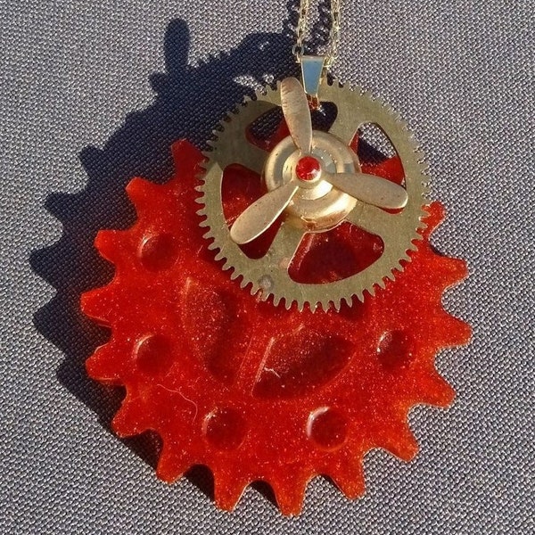 Necklace unique piece, steampunk: The Propeller, resin gear, brass and timepieces, stainless steel chain