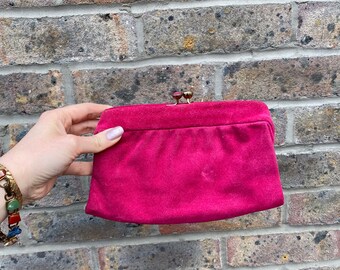 pale pink suede clutch bag