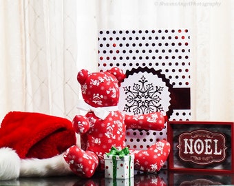 Christmas Scenes with Snow-capped Houses on Red Background