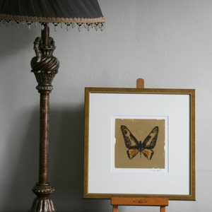 Hand painted butterfly in pen and ink silhouette on gold leaf on paper. image 2