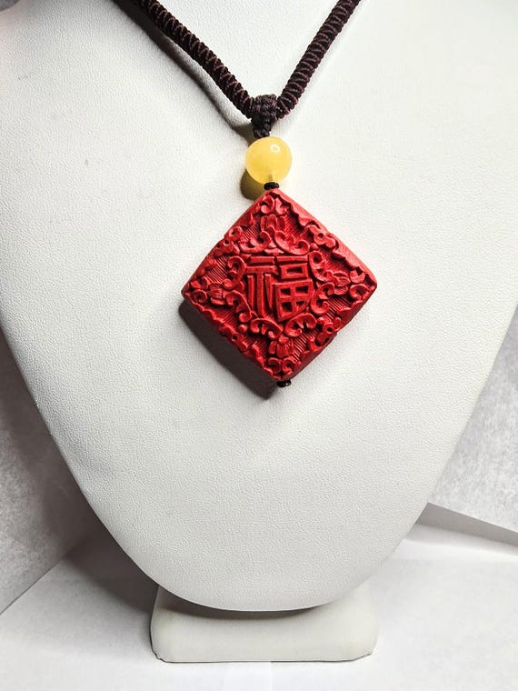 Carved Cinnabar Necklace