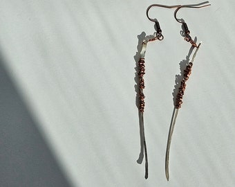 Kollektion av blandade metaller i sterlingsilver och koppar