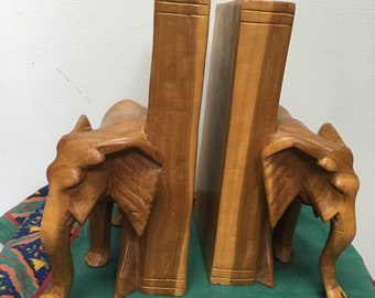 Carved wooden elephant bookends