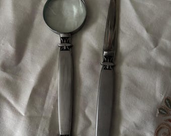 Letter opener and magnifying glass