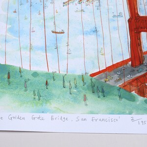 May include: A watercolor print of the Golden Gate Bridge in San Francisco, featuring a bright red bridge structure, a blue bay with small boats, and green hills with small figures. The text 'The Golden Gate Bridge, San Francisco' and '2/195' is printed at the bottom.