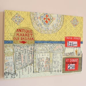 May include: An artistic painting of a market scene with the text "ANTIQUE MARKET OLD BAZAAR". The painting features architectural details, figures, and price tags for "TAVUK DONER" and "ET DONER". The color palette includes yellow, red, and blue.