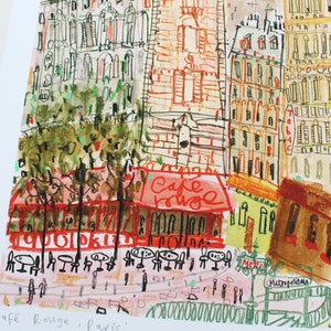May include: A colorful illustration of a Parisian street scene with a cafe called "Cafe Rouge" and a sign that says "Metro" and "Metropolitan". The illustration is done in a whimsical style with a mix of watercolor and pen.